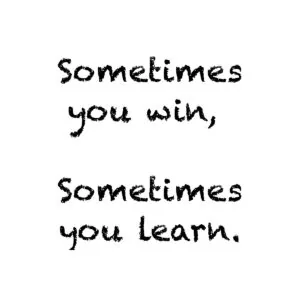 Handwritten text reading "Sometimes you win, Sometimes you learn."